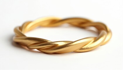 Naklejka premium Elegant twisted gold bracelet on white background. Minimalist jewelry design, luxury accessory for women. Ideal for jewellery shop, fashion blog, website, social media content. Perfect for showing