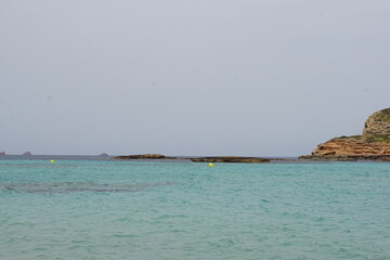 seagulls, bird, rocks, playa comte, ibiza, balearic islands, spain, spring, april 2025, sea, Mediterranean, water, holiday, rest, relax, beach, sunny day, island, landscape