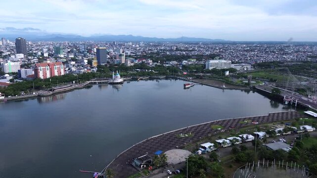 Modern Cityscape of Makassar from CPI Area &ndash; Coastal Urban Beauty