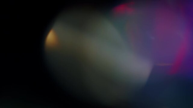 4K Lens flare and bokeh overlay on black background, abstract elegant light effects, transition overlay, high-quality organic footage lightleak, leak, flare for screen mode, optical rays.