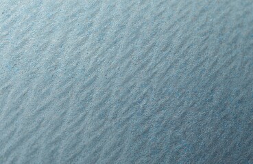 Rough blue-grey texture, abstract background. Patterned surface, stone, concrete, or similar material. Blank space for text, design, or artistic use. Perfect backdrop, wallpaper.