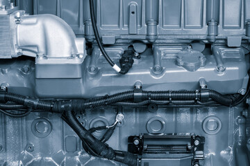 engine is a massive piece of machinery with many components and numerous bolts holding it together....