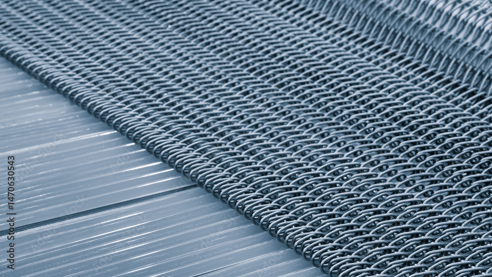 Aufkleber a close up of a silver metal wire with a pattern of squares and triangles. wire is twisted and bent 