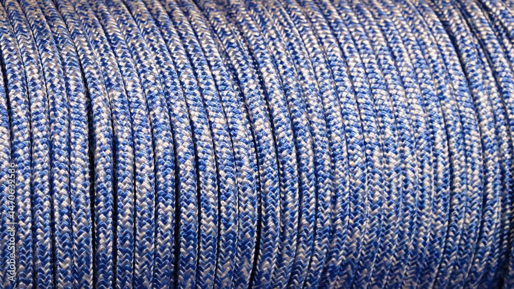 Aufkleber a blue and white rope is shown in the image. rope is long and has a striped pattern. blue and white 