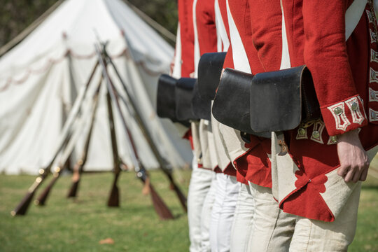 British forces line up in formation ready for battle plans during a Revolutionary war reenactment