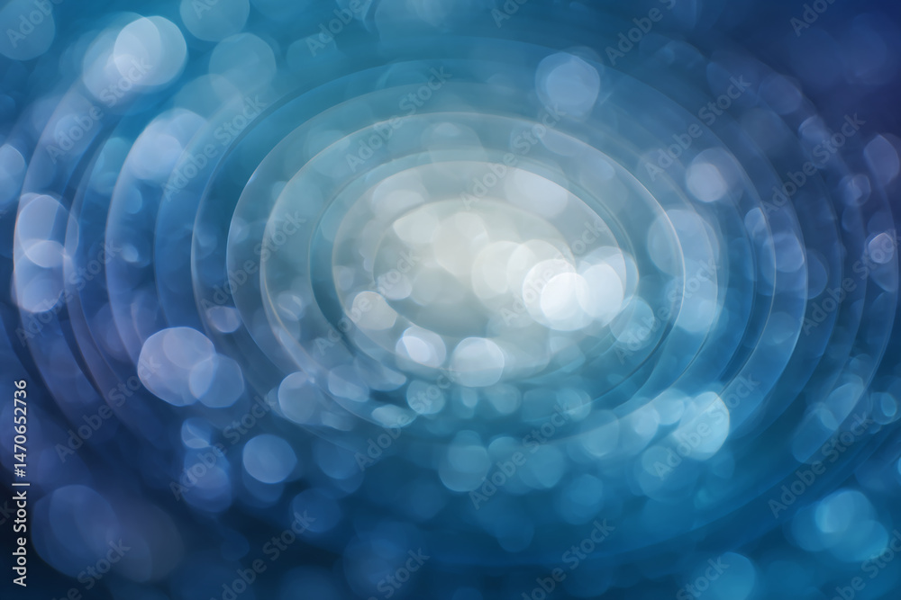 Poster abstract blue bokeh background with concentric circles, creating a soft, swirling effect, suggestive