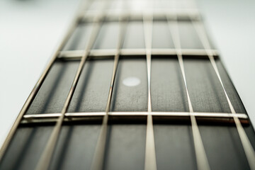 Aerial view of an acoustic guitar, showcasing its harmonious structure and musical potential Warm...