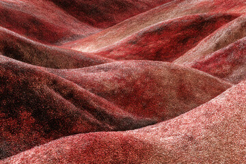 Rolling Terrain in Crimson Hues: An abstract composition showcases rolling hills in rich, varied shades of crimson, inviting viewers to immerse in its textures and patterns.