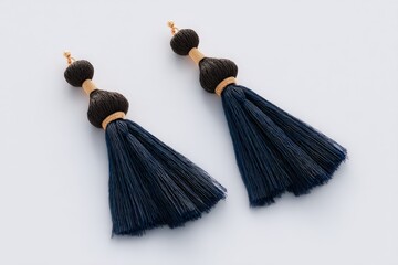 Elegant navy blue tassel earrings with dark brown accents. Perfect for adding a touch of sophistication to any outfit.