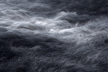 Mystic Movement: An artistic grayscale representation of flowing water, evoking a sense of ethereal motion and a moody ambiance, suitable for artistic uses.