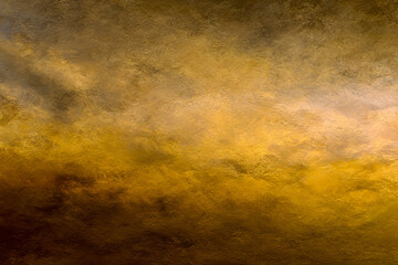 Golden Sky: A captivating shot of a moody sky, where golden hues and shades of brown intertwine to create a sense of drama and grandeur.