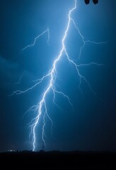 lightning strike is seen in the sky
