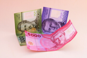 One thousand, two thousand and five thousand pesos, colorful chilean banknotes