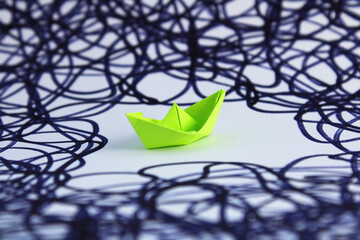 A ship trapped in a confined space surrounded by lines that complicate its exit
