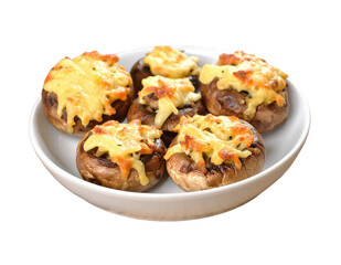 Six baked stuffed mushroom appetizers arranged artfully on a plate ready to eat
