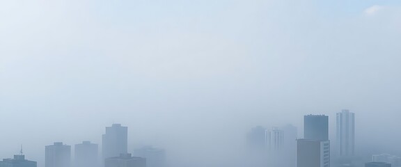 view of a city in the fog