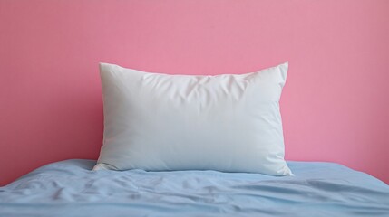 Elegant studio shot showcasing a plush pillow resting on a neatly made bed