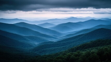 Obraz premium Serene mountain landscape captured with layers of undulating ridges and forests