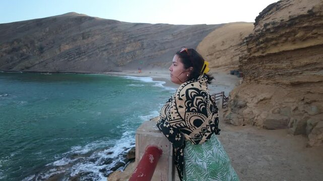 Tourist breathing fresh air at paracas national reserve