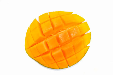 mango cut into cubes isolated on white background