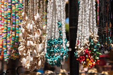 Seashell and Bead Necklaces. Necklaces made of seashells and beads in various colors for sale at a seaside shop in Zakynthos, Greece.