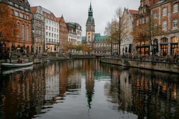 Fototapeta premium Charming European Canal Scene with Historic Architecture and Reflections in the Water