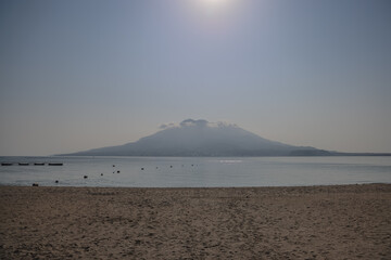 March 23 2025 Tranquil Beach Scene with Volcanic Mountain in the Distance, Japan