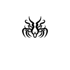 Intricate tribal design featuring a stylized animal face with flowing lines and sharp features