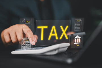 Businessman calculating tax with laptop, calculator, and financial documents, accounting...