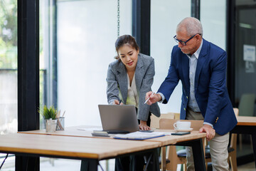Two Business working at office with documents on his desk, doing planning analyzing the financial report, business plan investment, finance analysis concept	
