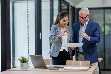 Happy business people smiling business man and  business women working together in office
