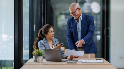 Happy business people smiling business man and  business women working together in office
