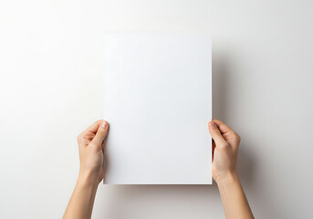 Woman holding blank white board