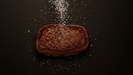 塩の魔法をふりかける至福のステーキ/Sprinkling the Magic of Salt on a Perfect Steak Generative AI