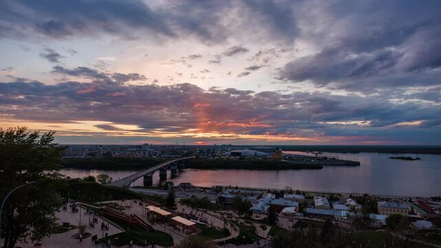A stunning sunset 4K time-lapse capturing the famous view of the arrow in Nizhny Novgorod, where the Oka River flows into the mighty Volga
