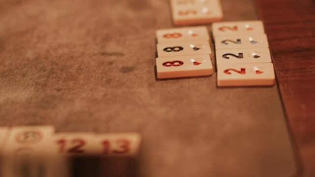 Traditional Turkish Board Game Okey stock-OK-hobby-fun-game,Traditional Turkish Board Game Okey stock -hobby-fun-game-Turkish board game Okey (Rummikub). A table Hands of the players