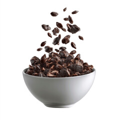 Obraz premium Cacao Nibs Falling into a Bowl - Delicious and Healthy Superfood