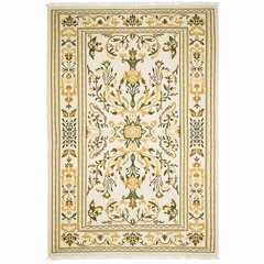A traditional rectangular rug with faded vintage-style patterns in earthy tones.