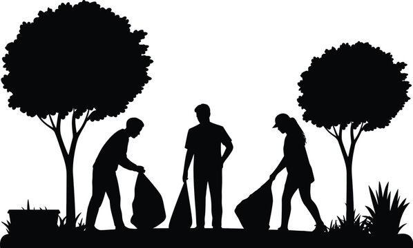 Group of volunteers collecting trash in park area for environmental protection