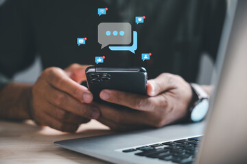 Forge of Modern Digital Titans, Man, with laptop and smartphone, forges a legacy of digital titans through social media, SNS, online marketing. A testament to modern business prowess.