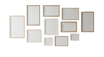 Eclectic picture frames cluster on wall