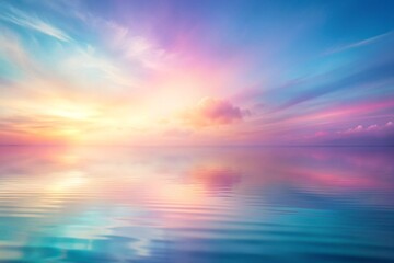 Obraz premium Beautiful pastel sunset reflecting on calm water creating a serene and picturesque landscape scenery