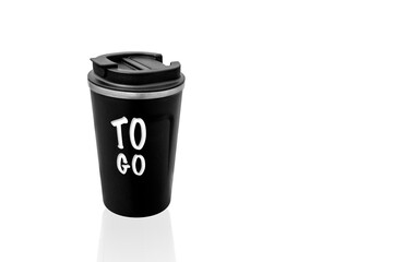 Black thermo cup for coffee on a white background. Hot drink thermos mug