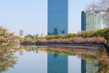 Osaka, Japan - April 14, 2024: Osaka Business Park, seen from the east outer moat of Osaka Castle...