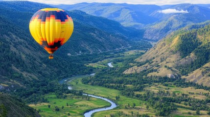 Obraz premium Colorful Hot Air Balloon Over Scenic Valley and River Landscape