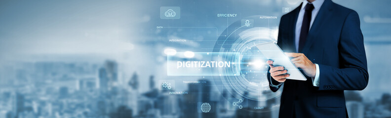 Digitization, businessman using tablet analyzing digital transformation data and cloud-based network. Business process automation, real-time data analytics, enterprise resource planning solutions