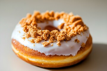 Cookie-Filled Donut with White Glaze and Crushed Biscuits for a Decadent Gourmet Treat