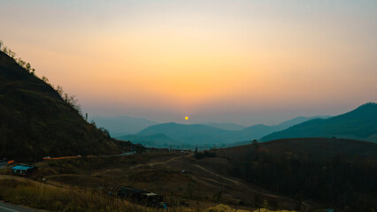View of the sun setting in Thailand