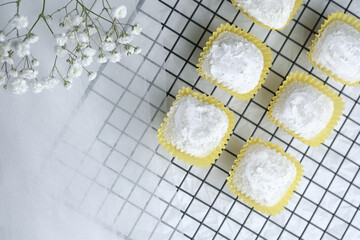 Delicate coconut bites arranged artistically on a cooling rack