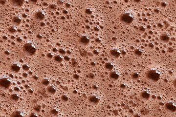 Surface of hot chocolate or cacao with bubbles seamless texture